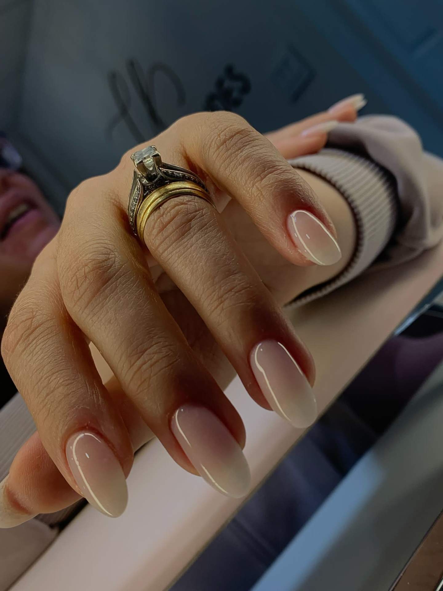 Natural ombre almond nails with gold ring