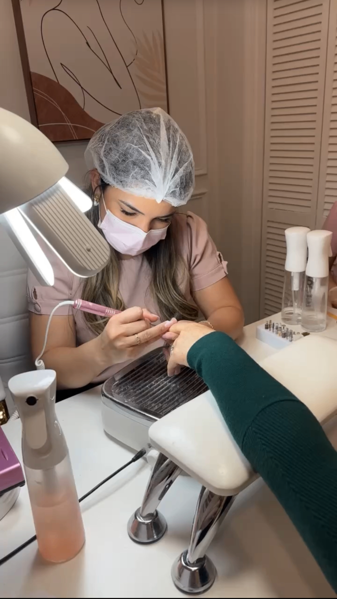 Carla at her sanitized work station