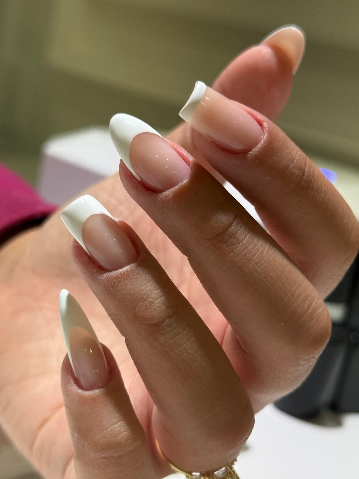 Classic white french almond manicure