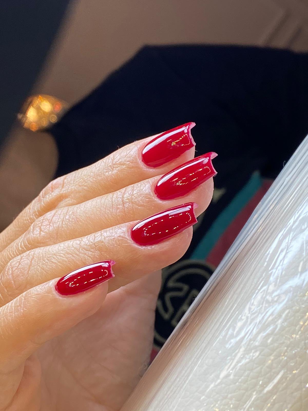 Glossy red gel manicure